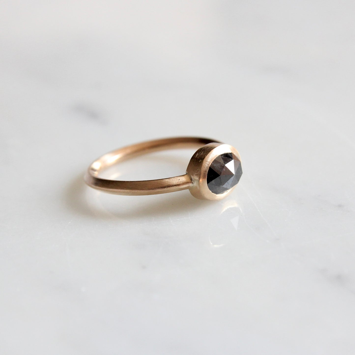 Oval East - West Black Rosecut Diamond